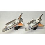 Two 4D Vision cutaway Space Shuttle models. 1 looks complete (nothing obvious missing), the other is