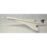 Large fibreglass travel agent type model Concorde with a small chrome stand. Model in British