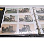 Folder containing approximately four hundred postcards of castles such as Crayke, Criccieth,