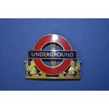 London Underground enamel yellow metal surround cap badge W54mm