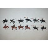 8 vintage cast metal lancers, 2 Hussars and 2 mounted buglers from Britain’s toy soldier range.