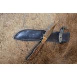 Harry Boden bowie style knife, with clip blade and brass and two piece dark walnut handle, full