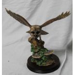 Border Fine Arts Model of a tawny owl landing on a tree stump