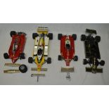 Four Tamiya 1:12 scale F1 models (all A/F)