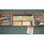 Assortment of OO gauge railway accessories including scenery, platforms, animals, trees,