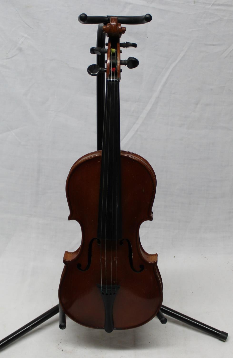 Cased violin with bow, labelled "Stradivarius"