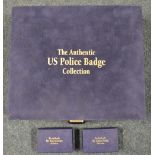 Authentic US Police badge collection by Mayfair, display box with two velvet trays containing 50