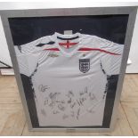 Framed England football shirt, signed by members of the Men's Senior Team 2008/9
