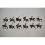 13 vintage metal Britain’s Dragoons with articulated right arms. Fair to good, some paint chippinG