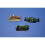 Three small enameled steam train badges including the Earl of Merioneth etc.