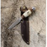 Nowill & Sons miniature scouting knife with brass cross guard, antler, leather and brass handle