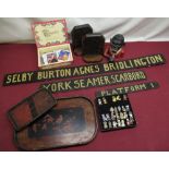 Selection of collectables including Robertson's Golly badges, Sambo money box, carved bookends,