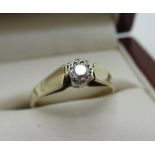 Hallmarked 9ct yellow gold solitaire ring with round cut diamond in a white metal mount, by HWT,