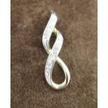 Hallmarked 9ct yellow gold figure eight pendant inset with round cut diamonds by S.G, 375, London,