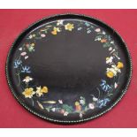 Early C20th circular paper mache tray with hand painted floral border depicting daffodils,