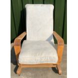 Beech framed chair with white loose cushions on casters (A/F)