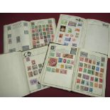 Four albums of mixed world stamps including GB and some interesting early material (4)