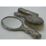 Edw.VII hallmarked Sterling silver repousse decorated hand mirror, Birmingham, 1903, a similar