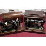Two Singer sewing machines in original cases