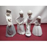 Four Nao porcelain figures