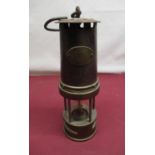 Brass and steel miners safety lamp marked 19, H27cm