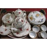C19th pottery tea service in a Rockingham shape, consisting teapot, sucriere, sugar bowl, milk jug