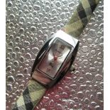 Ladies Burberry quartz wristwatch, high polished stainless steel case, with snap on back numbered