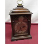 Geo.I style walnut cased bracket timepiece, caddy top with brass handle, glazed break arc