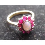 18ct yellow gold opal and ruby cluster ring, stamped 750, size P 1/2, 4g