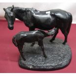 Mid C20th cast iron figure of a mare and foal, indistinctly signed on base, (ear A/F), H30cm