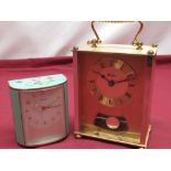 1950's ladies Kienzle bedside alarm, brass case decorated with exotic birds, Woodford quartz brass
