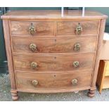 Mahogany bow fronted chest of drawers of two short over three long with black painted escutcheons,