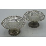 Pair of Geo. V silver bonbon dishes in the form of miniature comports, pierced border on pedestal