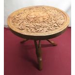 Burmese/South East Asian carved hardwood occasional table on foldable tripod legs, H48cm