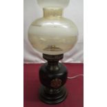 Oil lamp converted to electric with wooden base and brass crests (missing chimney)