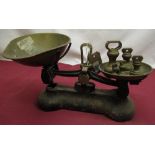Pair of early C20th kitchen scales with brass pans and brass dumbbell weights, 1lb, 8oz, 4oz, 2oz,