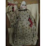 Victorian hand painted bisque head doll, with soft body, porcelain arms and legs in period box,