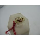 18ct yellow gold diamond and garnet gypsy style ring, stamped 18ct, size H, 2.1g