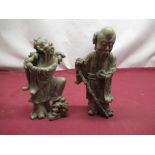 Pair of Chinese carved soapstone figures of travelling sages, H18cm