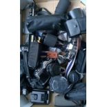 Collection of various cameras and cases