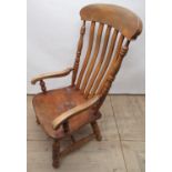 Victorian elm and beech slat back kitchen arm chair on turned supports with stretchers