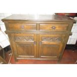 Old Charm oak low dresser with two drawers above two linen fold and arcade carved panel doors, W93cm