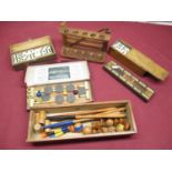 Two early C20th table croquet games (one Busseys), two boxes of bone dominoes, cribbage board and