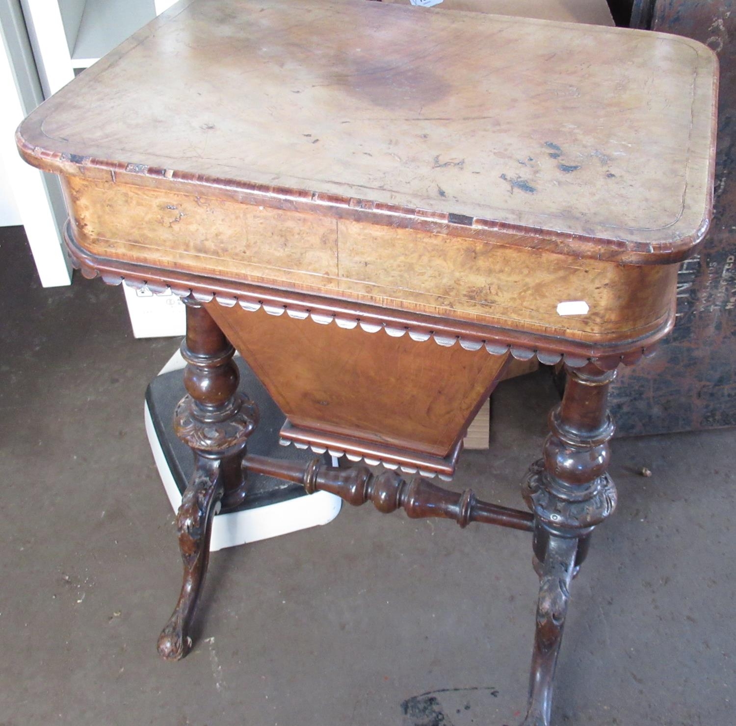 Victorian figured walnut rectangular sewing table, hinged top, fitted interior on vase turned column