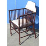 Edwardian mahogany armchair with upholstered top rail and seat, slender turned galleried back and