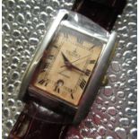 As new Poljot International automatic wristwatch with date, rectangular stainless steel and gold