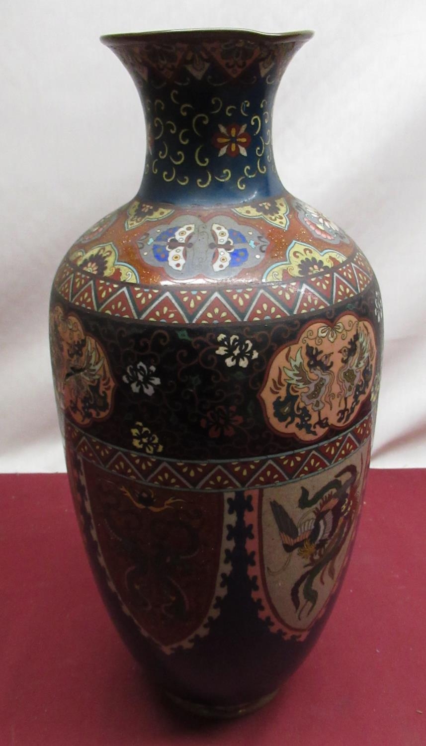 Early C20th Chinese Cloisonné ware vase of baluster design, mostly blue ground, alternating panels