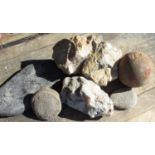 Two rough cut quartz specimens, other rock specimens and a croquet ball