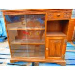 Old Charm oak side cabinet with two glazed doors, linen fold panel door and Gothic drawer on
