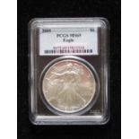 PCGS M69 graded 2005 USD $1 fine silver eagle dollar, slabbed and tagged